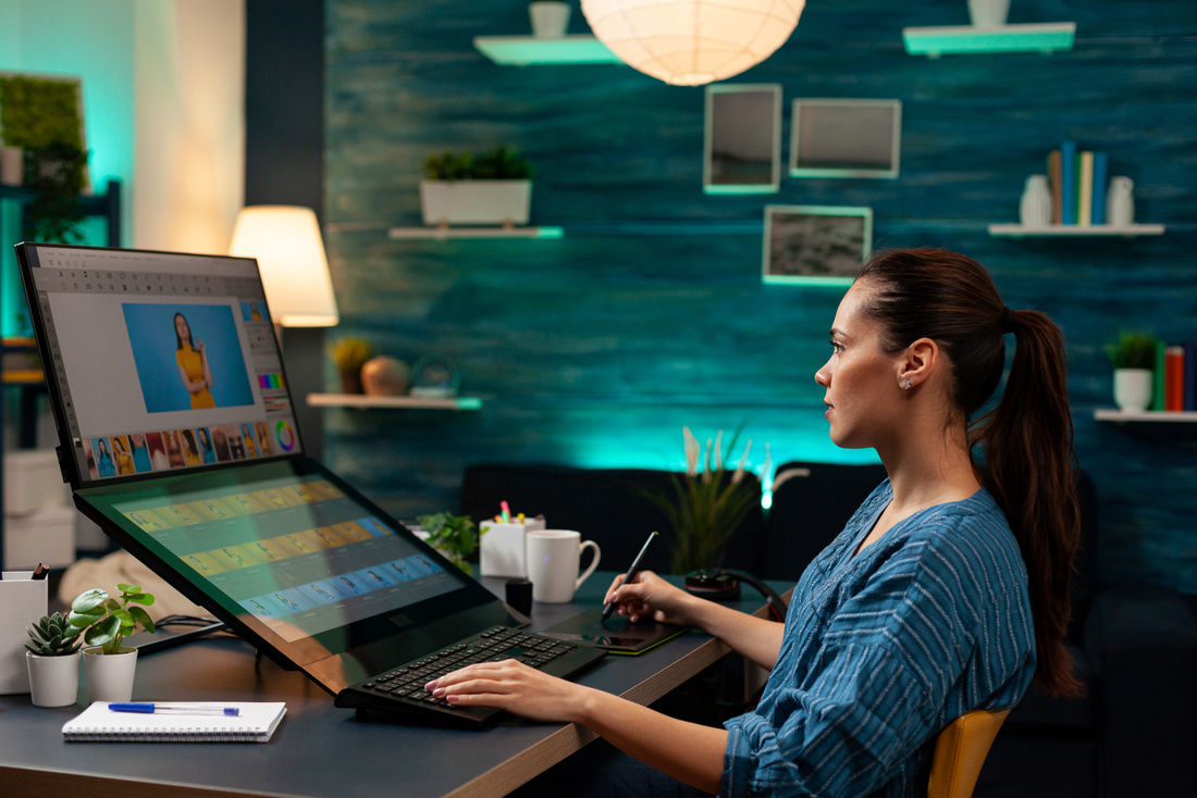 Retouch studio worker editing picture of model